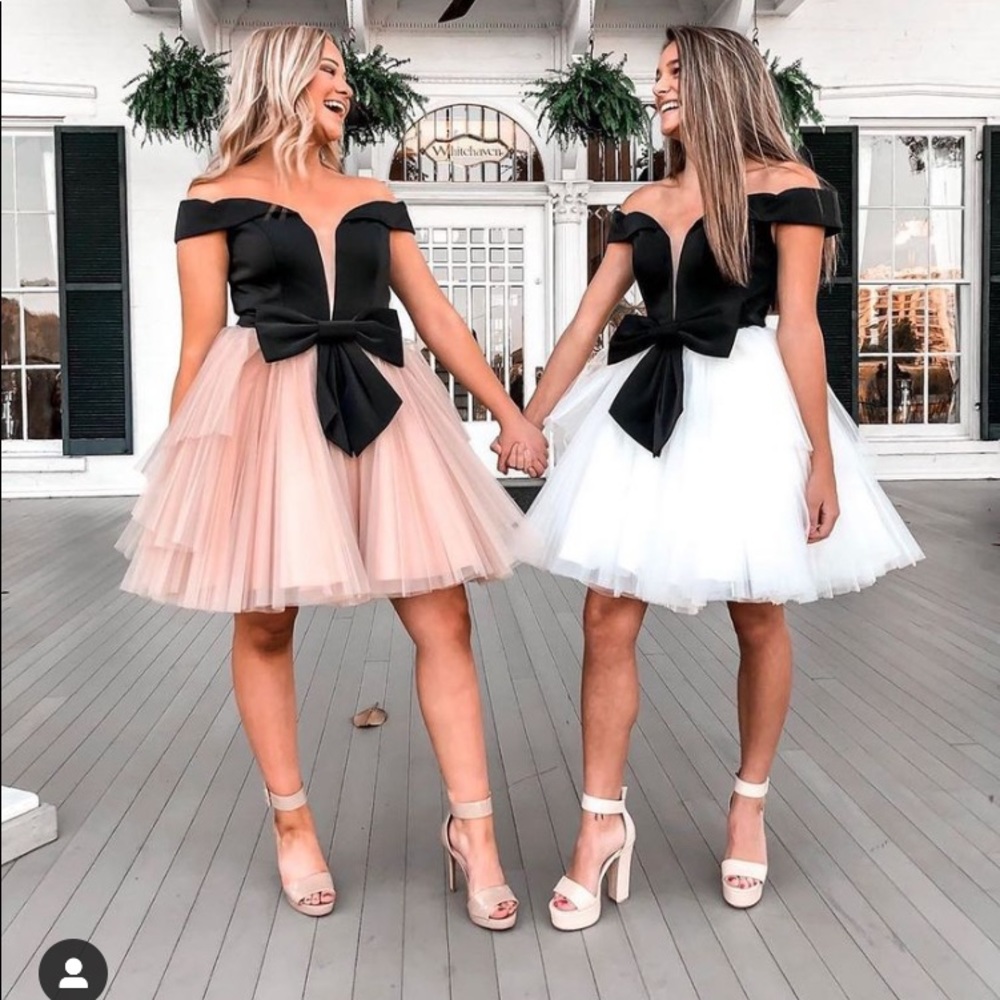 Ashley Lauren short white tulle dress with black bow. Style # 4285